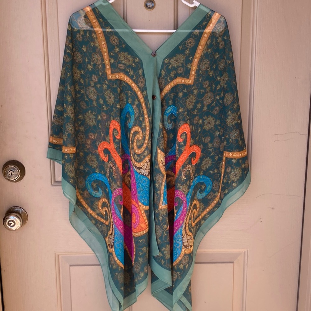 woman’s large colorful silky poncho/ shawl